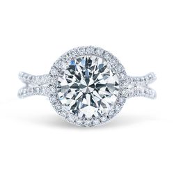 Double halo curved split-shank semi-mount with round diamonds.  D0.50ct.t.w.