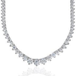 16' Graduating tennis necklace in 18K WG with 3-prong set round diamonds.  D8.13ct.t.w.  (Center 0.56ct.)