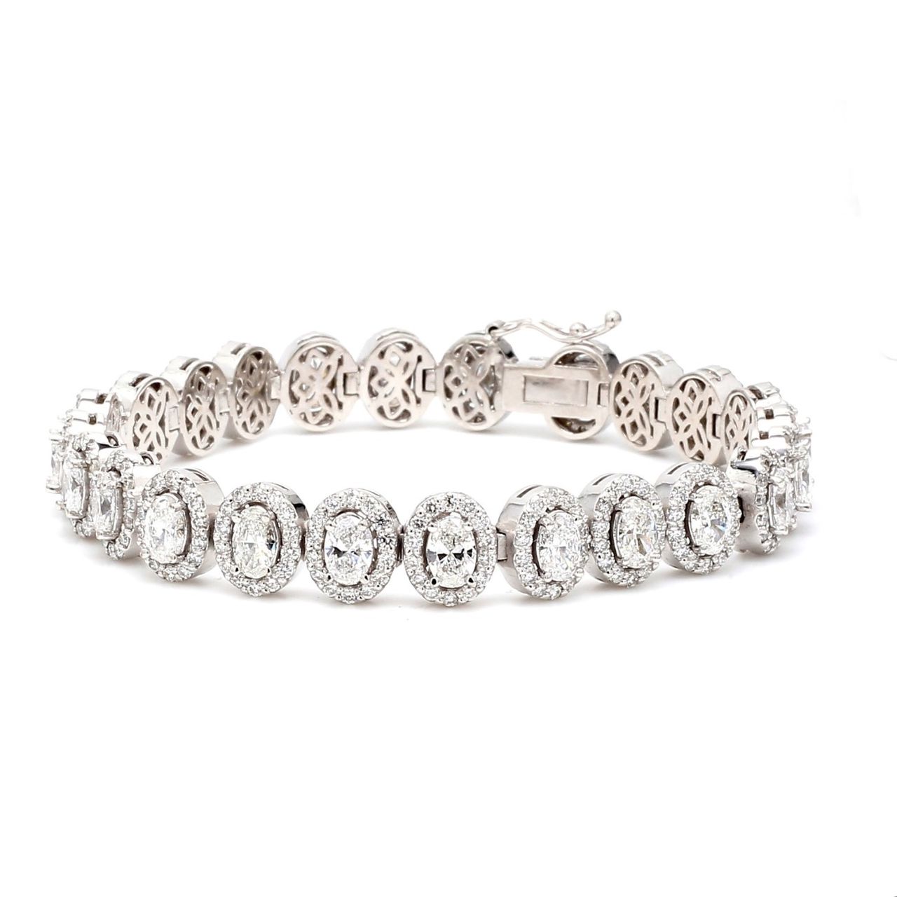 7' Halo tennis bracelet with pave set rounds around prong set (24) oval diamonds.  D9.39ct.t.w.