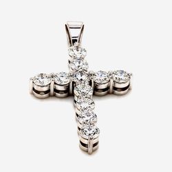 1' Cross pendant in 18K WG with basket prong set (11) round diamonds.  D2.81ct.t.w.