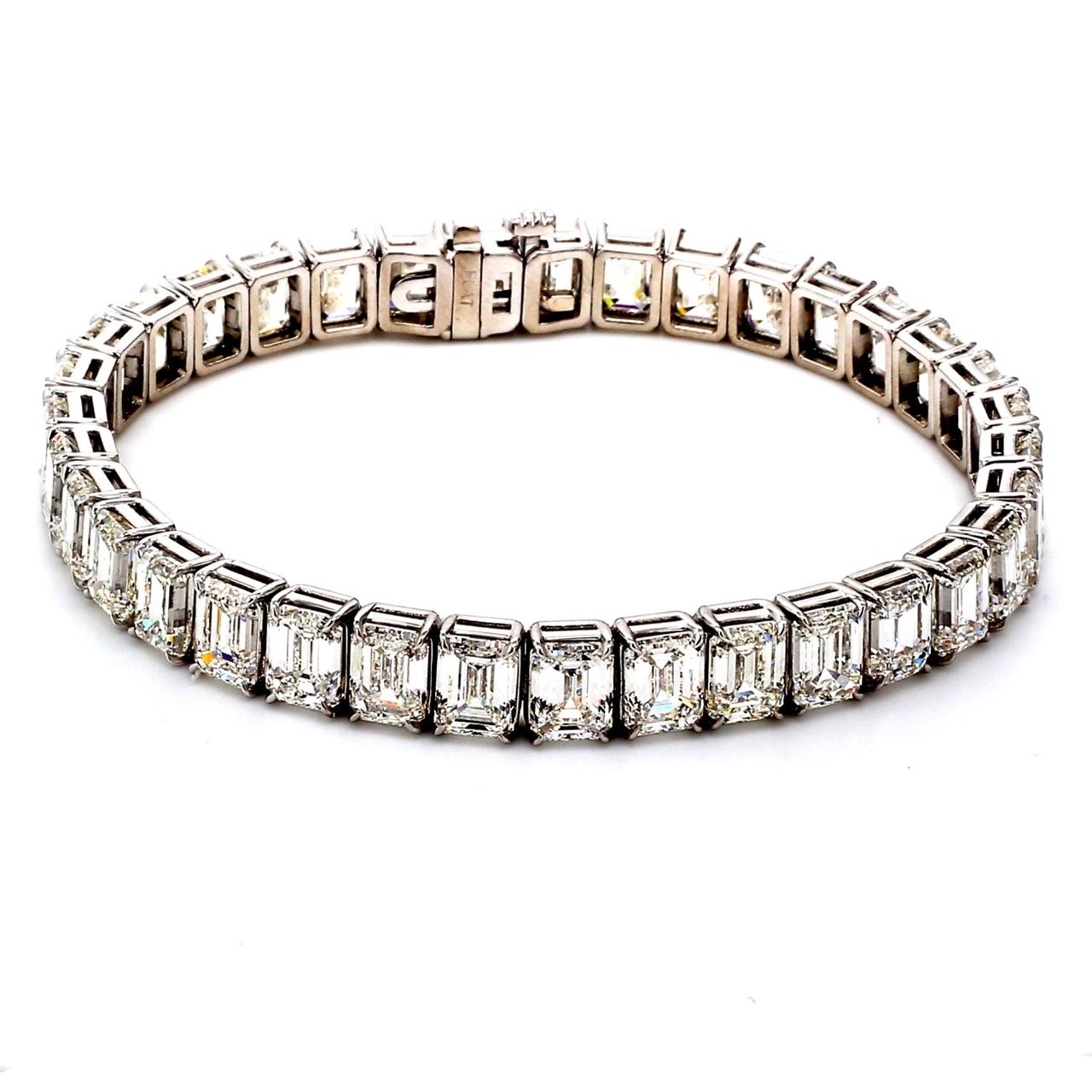 7' Tennis bracelet with basket 4-prong set (57) emerald cut diamonds.  D13.09ct.t.w.