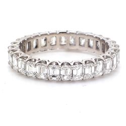 Eternity band in 18K WG with prong set (28) emerald cut diamonds.  D2.38ct.t.w.  Size 5