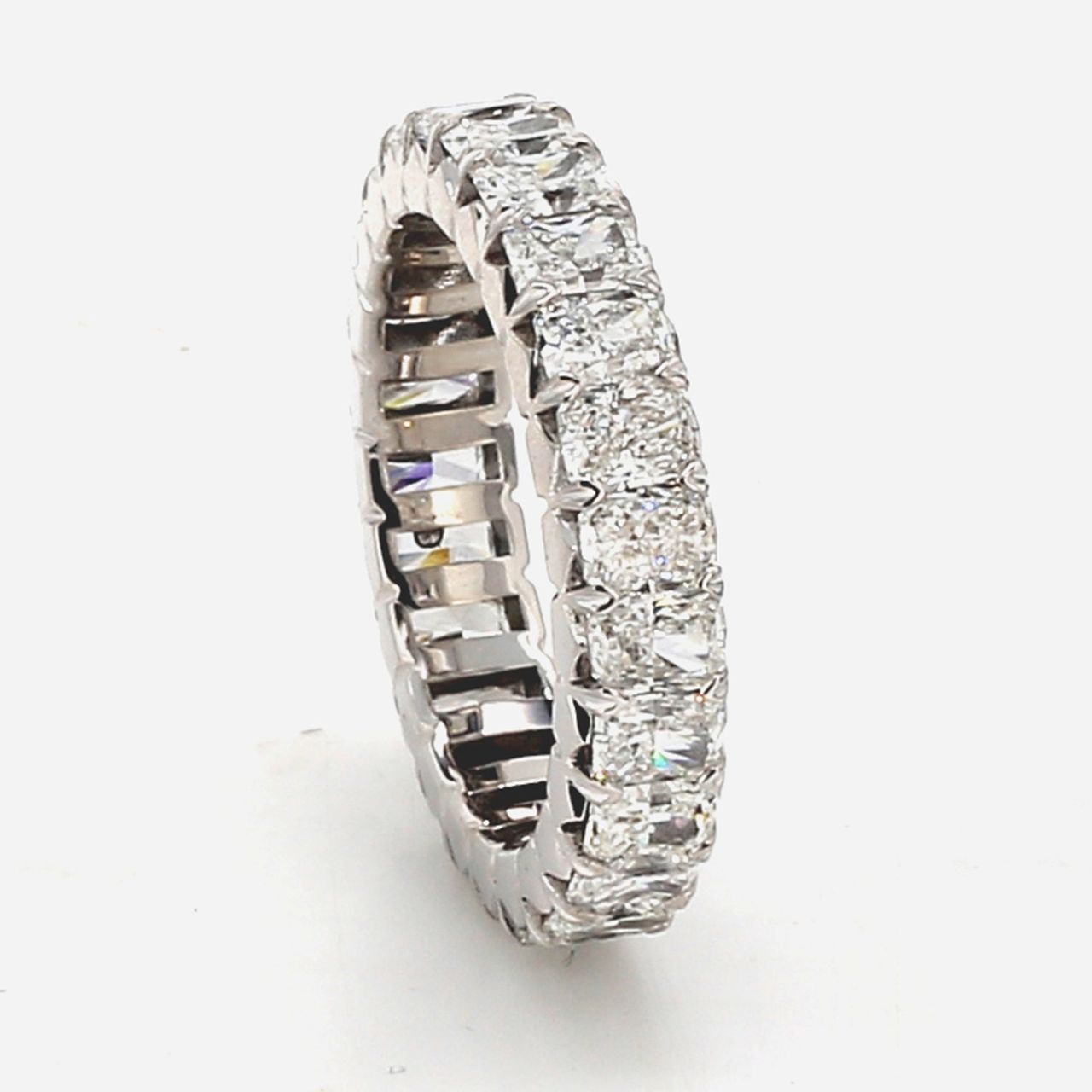 Eternity band in 18K WG with prong set (25) radiant cut diamonds.  D3.71ct.t.w.