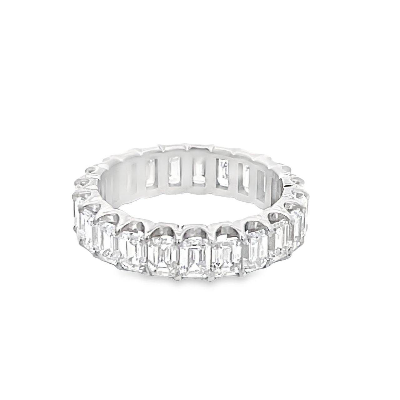 Eternity band with U-prong set (24) emerald cut diamonds.  D3.91ct.t.w.  Size 5.75