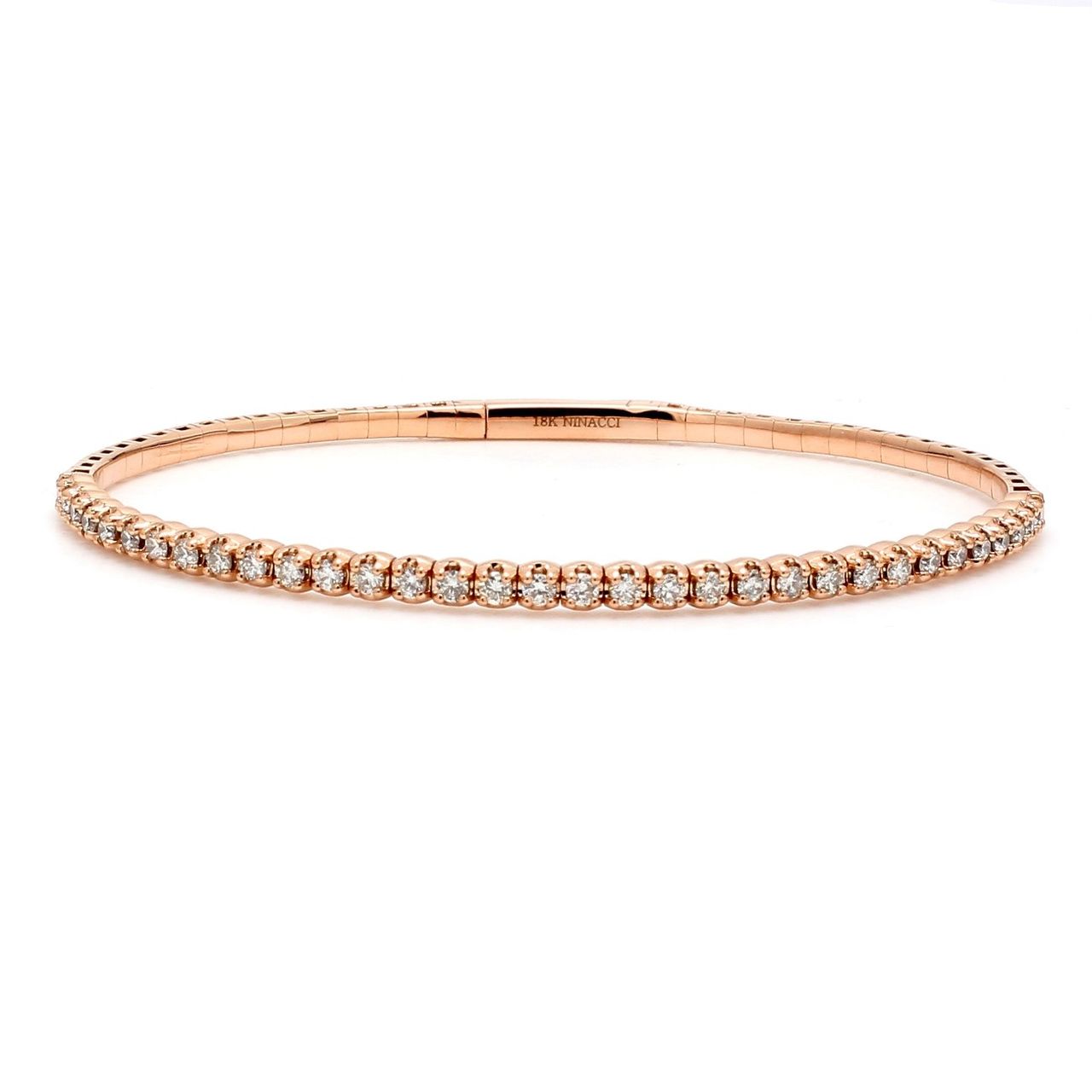 Light weight flexible oval shaped bangle in 18K RG with prong set round diamonds.  D1.00ct.t.w.