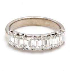7 -stone band in platinum with prong set emerald cut diamonds.  D1.89ct.t.w.  Size 7