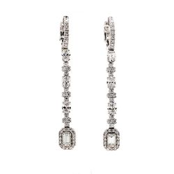Halo dangling earrings with prong set round, oval, & emerald cut diamonds.  D2.52ct.t.w.