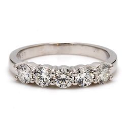5-stone band in platinum with shared prong round diamonds.  D0.79ct.t.w.  Size 6.5