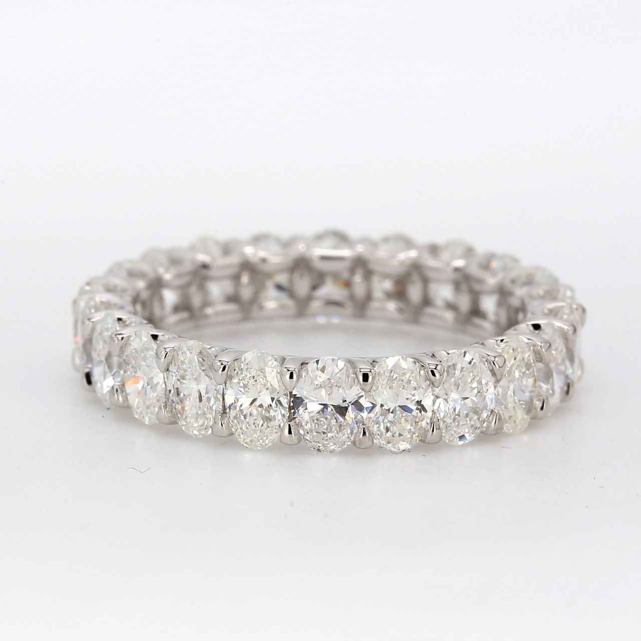 Eternity band in 18K WG with U-prong set oval diamonds.  D3.00ct.t.w.  Size 5.5