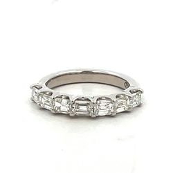 7-stone band east west style in platinum with prong set emerald cut diamonds.  D1.31ct.t.w.  Size 5.5