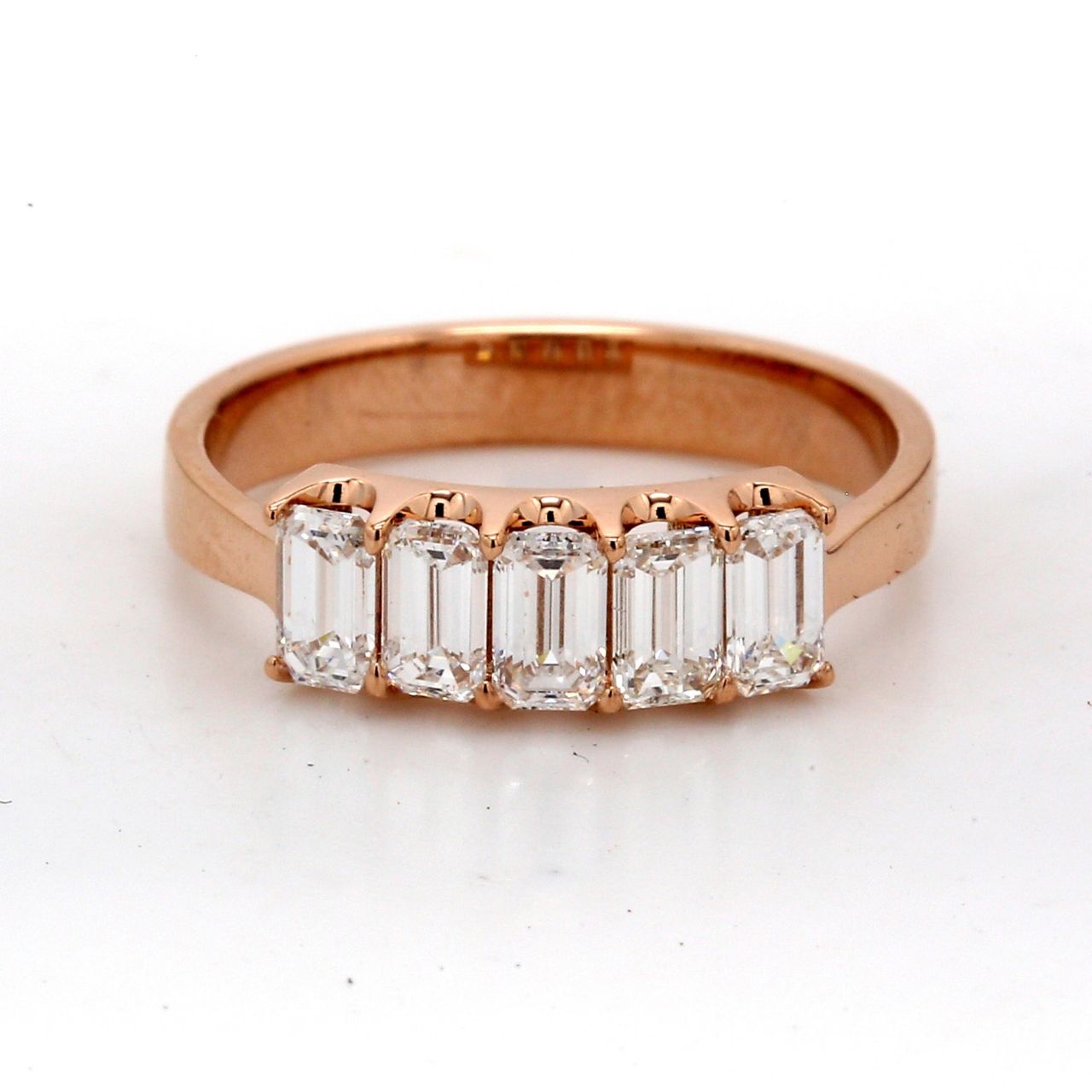 5-stone band in 18K RG with U-prong set emerald cut diamonds.  D0.93ct.t.w.  Size 5.5