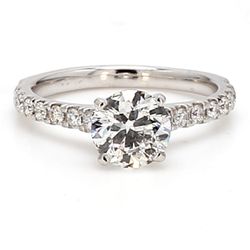 Ring in white gold with prong set rounds on shank and USA certified G/SI2 round diamond center.  D1.40ct.t.w.  (Center - 1.00ct.) Size 4