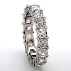 Eternity band in platinum with shared prong set (18) asscher cut diamonds.  D3.74ct.t.w.  Size 5