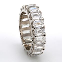 Eternity band in platinum with U-prong set (19) emerald cut diamonds.  D5.84ct.t.w.  Size 5.5
