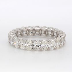 Eternity band in 18K WG with U-prong set oval diamonds.  D3.00ct.t.w.  Size 5.5