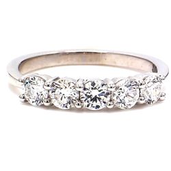 5-stone band in platinum with prong set round diamonds.  D0.73ct.t.w.  Size 5