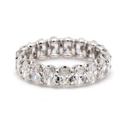 Eternity band in platinum with U-prong set (17) oval diamonds.  D5.16ct.t.w.  Size 6