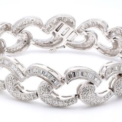 7' Antique style bracelet in 18K WG with baguette & round diamonds.  D4.50ct.t.w.