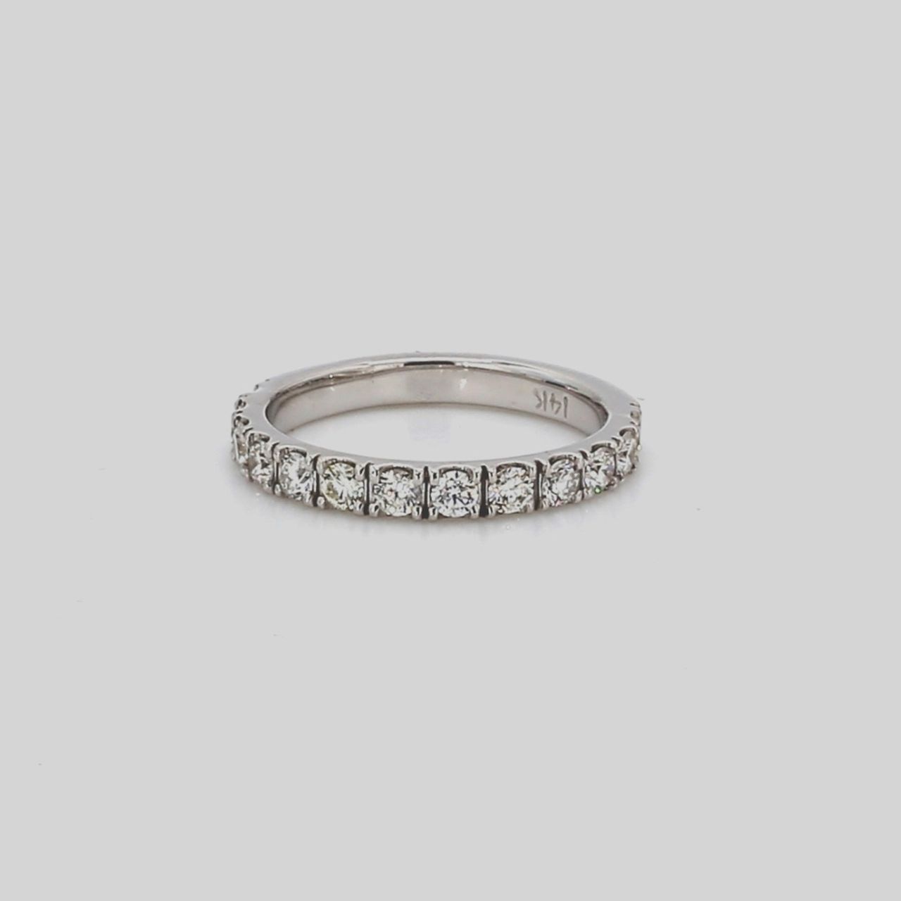 Band with u-prong set round diamonds.  D0.57ct.t.w.  Size 5