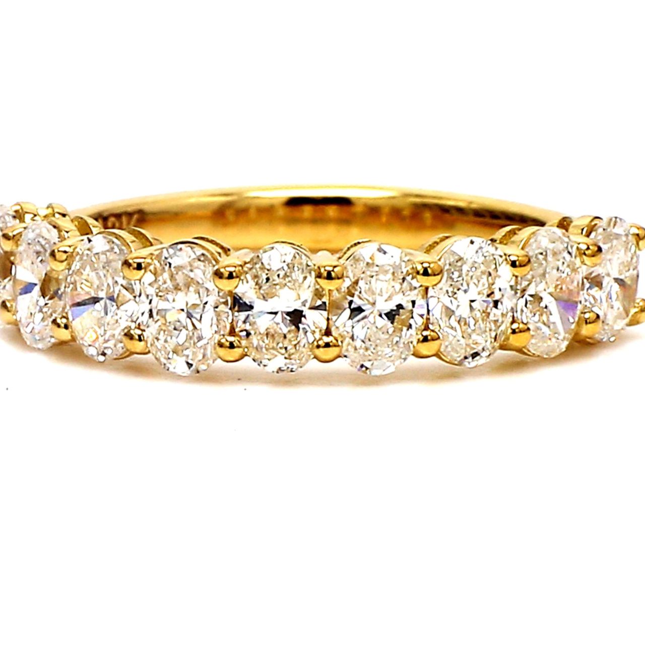9-stone band in 18K YG with basket prong set oval cut diamonds.  D1.69ct.t.w.  Size 7.25