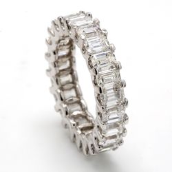 Eternity band with U-prong set emerald cut diamonds.  D5.81ct.t.w.