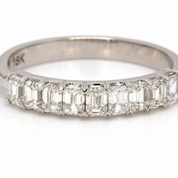 9-stone band in 18K WG with prong set emerald cut diamonds.  D0.86ct.t.w.  Size 6