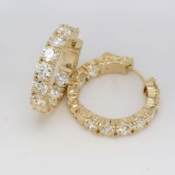 1' Inside out hoop earrings with 4-prong basket set round diamonds.  D5.62ct.t.w.