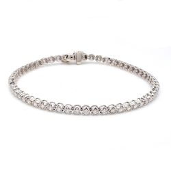7' Tennis bracelet with crown head prong set (56) round diamonds.  D1.95ct.t.w.