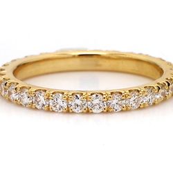 Eternity band in 18K YG with U-prong set (29) round diamonds.  D0.84ct.t.w.  Size 5