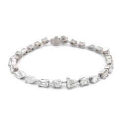 7' Bar bracelet in platinum with prong set multi-shape diamonds.  D6.29ct.t.w.