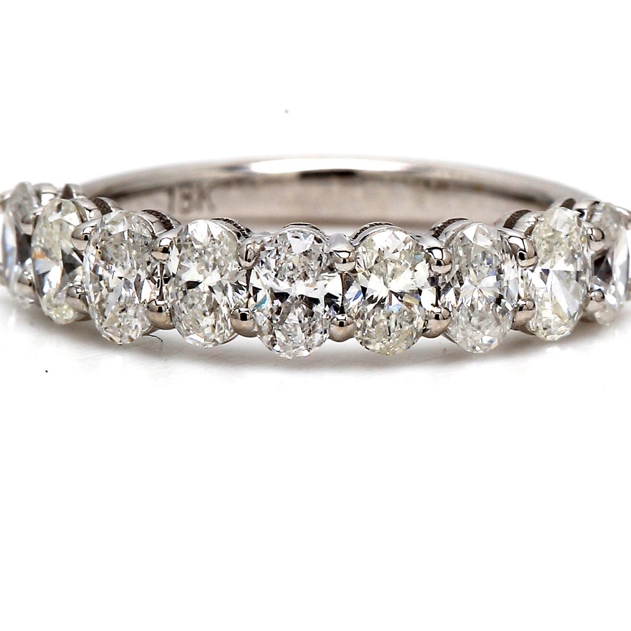 9-stone band in 18K WG with shared prong set oval diamonds.  D1.19ct.t.w.  Size 7.5