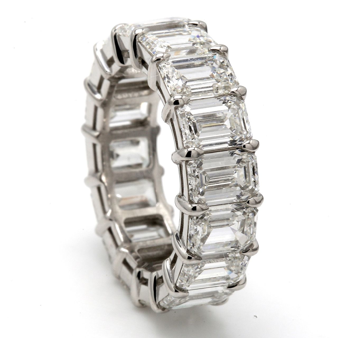 Eternity band in platinum with U-prong seet GIA certified H/VVS1-VS2 (17) emerald cut diamonds.  D9.21ct.t.w.  Size 6