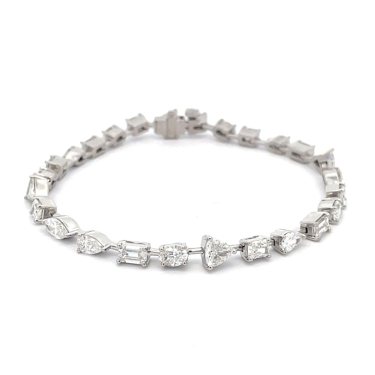 7' Bar bracelet in platinum with prong set multi-shape diamonds.  D6.29ct.t.w.