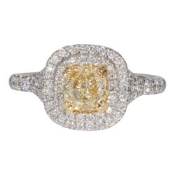 Halo semi split shank ring in 18K WG with prong set rounds around GIA certifid FLY/VS2 cushion cut diamond center stone.  D1.48ct.t.w.  (Center 1.00ct.)