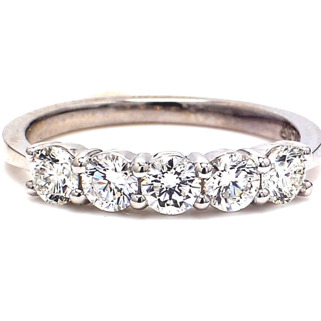 5-stone band in platinum with prong set round diamonds.  D0.83ct.t.w.  Size 5.75