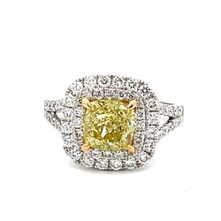 Double halo semi-mount in 18K WG with French pave set rounds.  D0.86ct.t.w.
