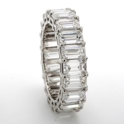 Eternity band in platinum with prong set (20) emerald cut diamonds.  D7.30ct.t.w.  Size 5.5