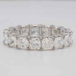 Eternity band in platinum with U-prong set square radiant diamonds.  D4.17ct.t.w.  Size 5.5