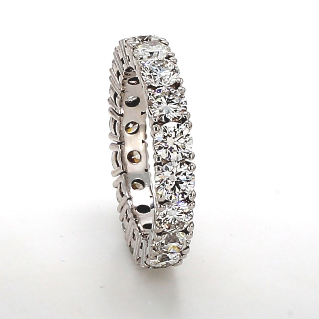 Eternity band in 18K WG with 4-prong set (18) round diamonds.  D3.33ct.t.w.  Size 5