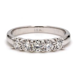 5-stone band with shared U-prong set round diamonds.  D0.73ct.t.w.