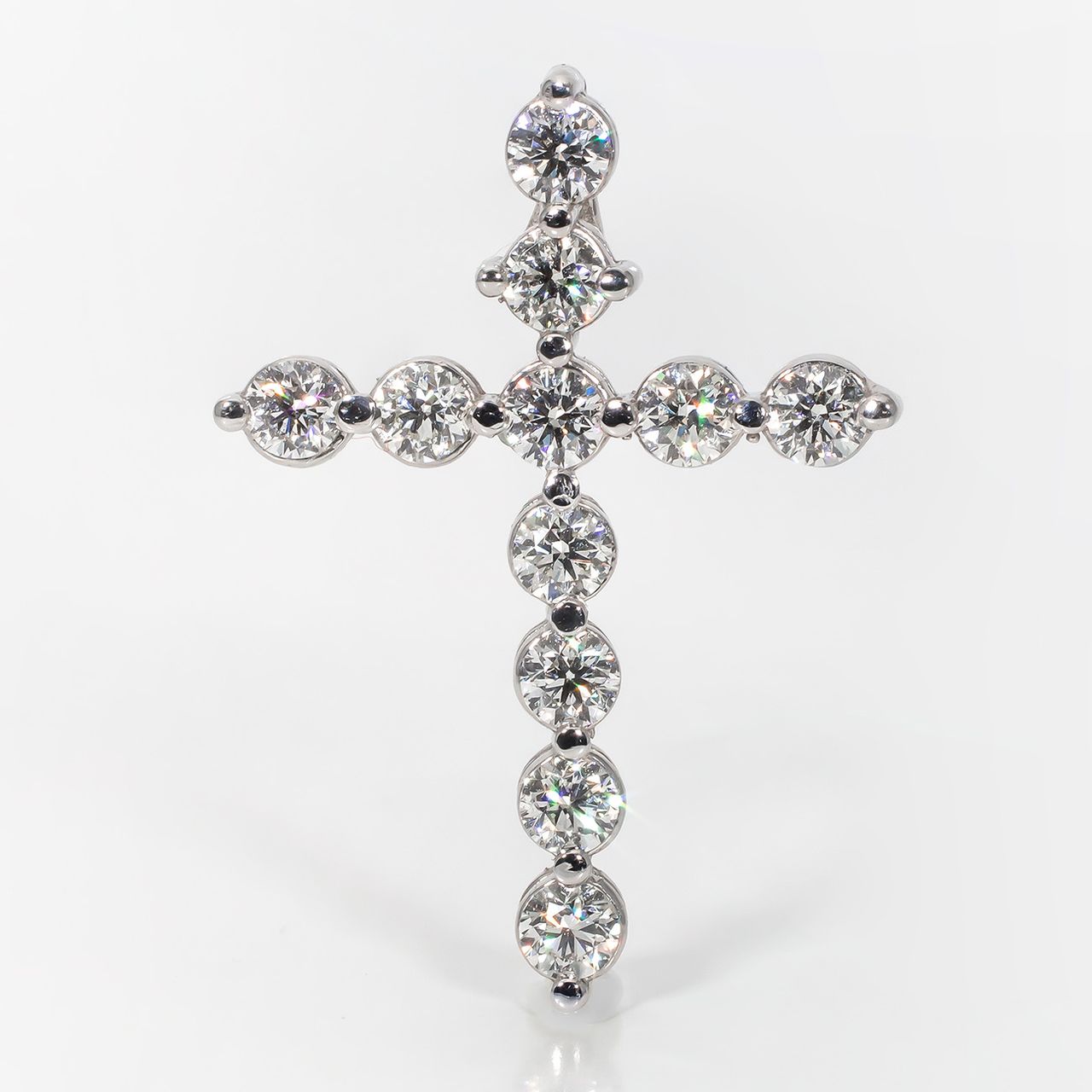 1.25' Cross pendant with shared prong set (11) round diamonds.  D2.10ct.t.w.
