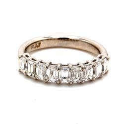 9-stone band in platinum with basket prong set emerald cut diamonds.  D6.15ct.t.w.  Size 6.5