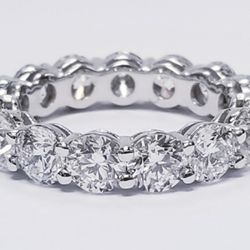 Eternity band in platinum with shared prong set (15) round diamonds. D4.57ct.t.w.  Size 5