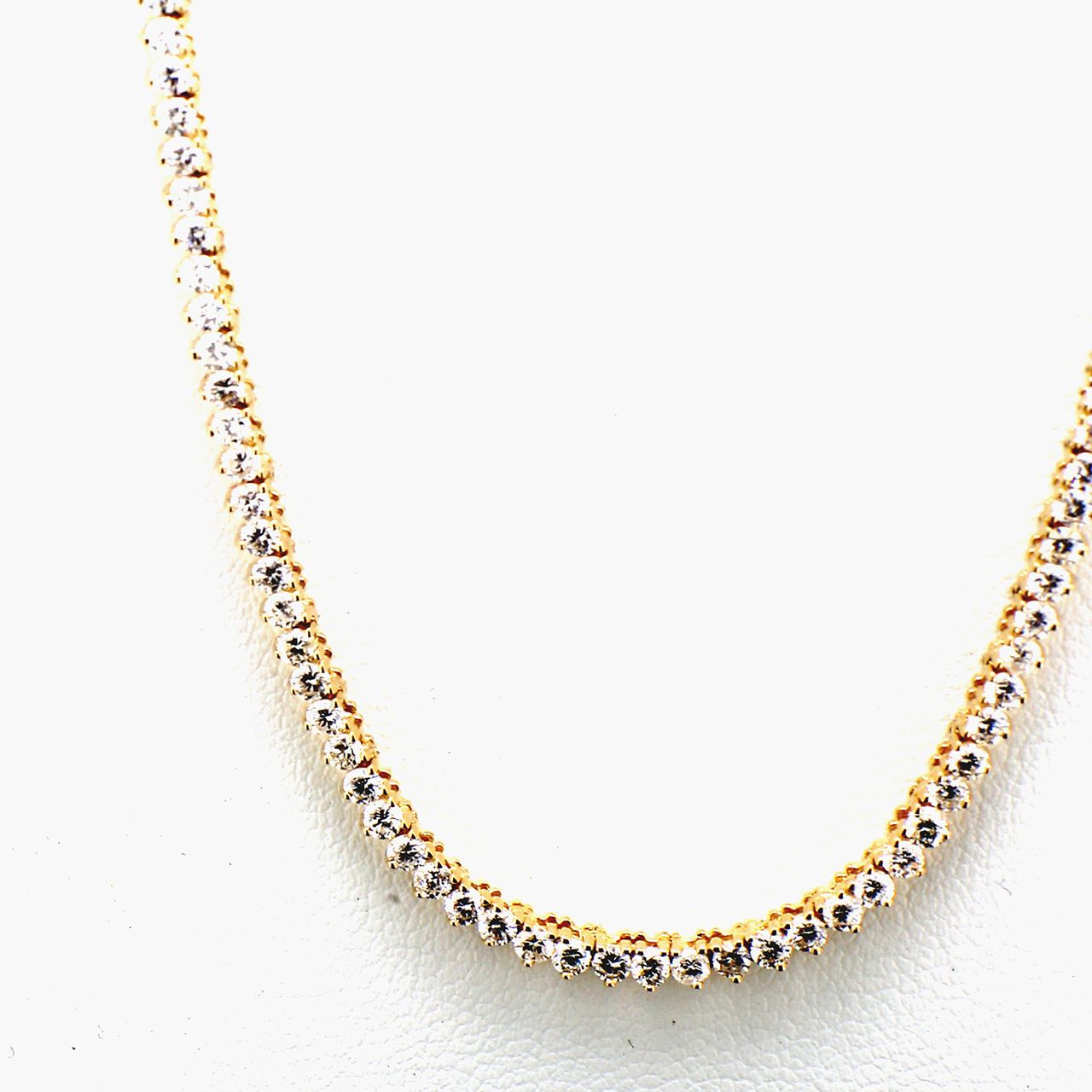 18' Tennis necklace in 14K YG with 3-prong set round diamonds.  D5.38ct.t.w.