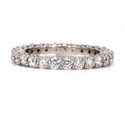 Eternity band with shared prong set (25) round diamonds.  D1.60ct.t.w.  Size 5.75