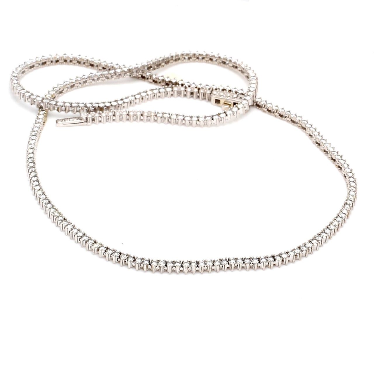 18' Tennis necklace with 3-prong set (228) round diamonds.  D5.00ct.t.w.