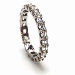 Eternity band east to west style with U-prong set (22) emerald cut diamonds.  D2.10ct.t.w.  Size 7
