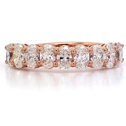 9-stone band in 18K RG with basket prong set oval cut diamonds.  D1.22ct.t.w.  Size 5