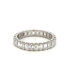 Eternity band with U-prong set (28) emerald cut diamonds.  D1.97ct.t.w.  Size 5