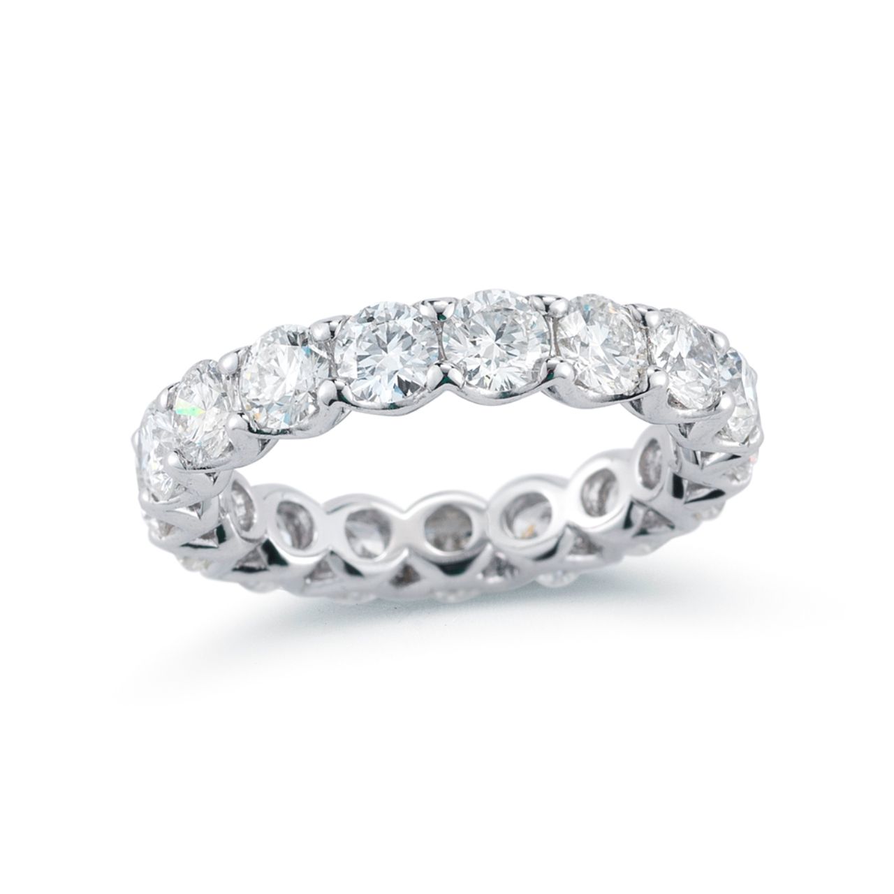Eternity band in platinum with shared prong set GIA certified E-F/VS1-VS2 (13) round diamonds.  D9.10ct.t.w.  Size 6.5